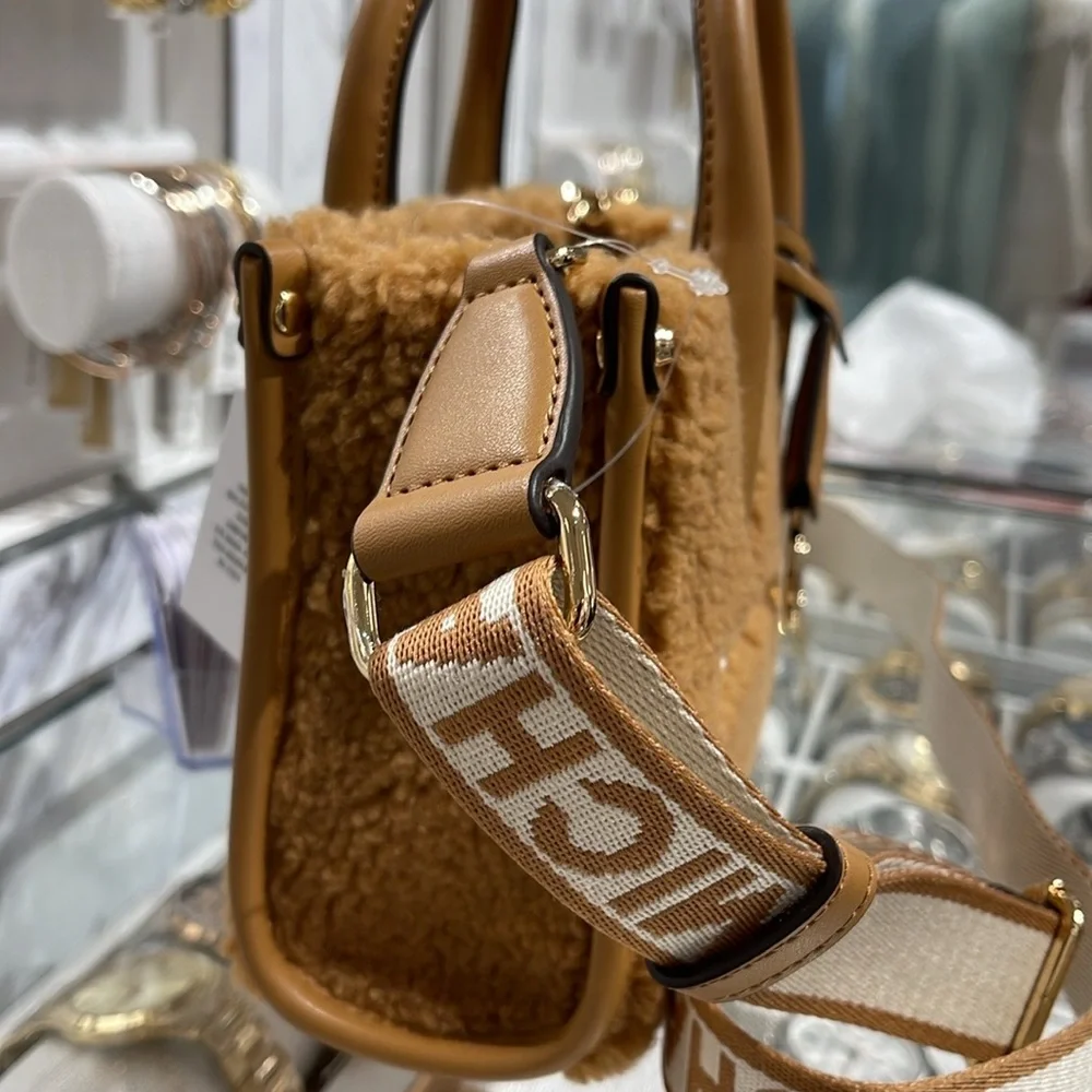 Michael Kors Mirella Extra-Small Sherpa XS SHOPPER XBODY
SHEARLING Crossbody - Picture 13 of 16